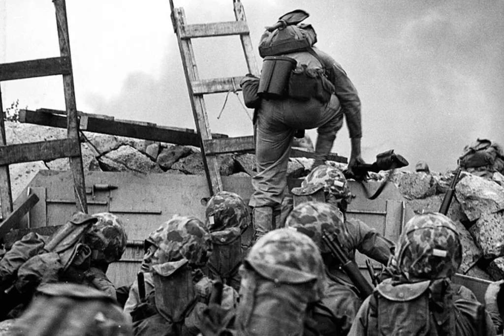 Image of U.S. Marines scaling a seawall at the Battle of Inchon