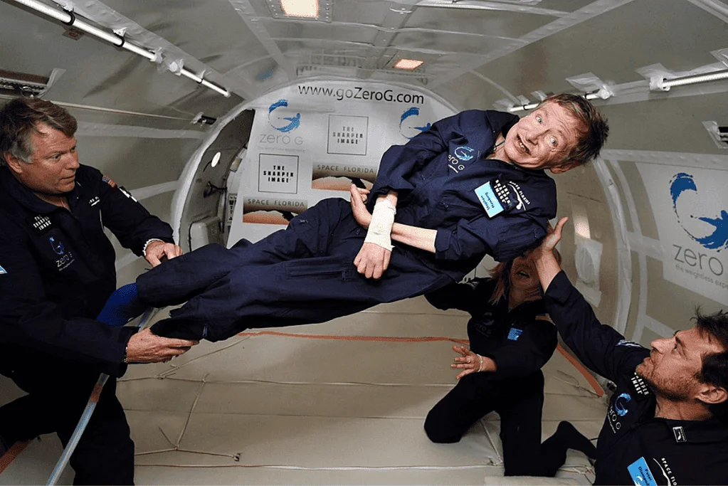 Image of Stephen Hawking, the iconic physicist, joyfully experiencing the sensation of weightlessness, defying his physical limitations.