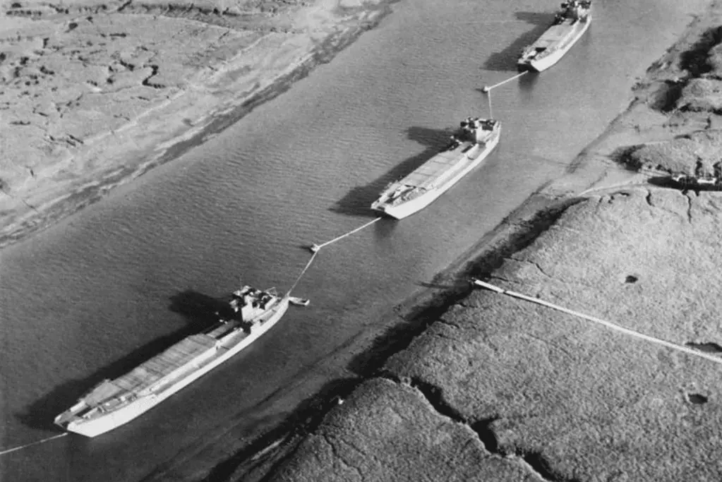 Image of dummy landing craft moored in an English river during Operation Fortitude.