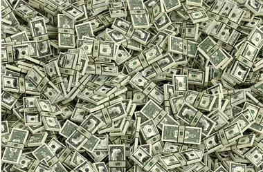 Image of stacks of cash for an article about the largest heists in history