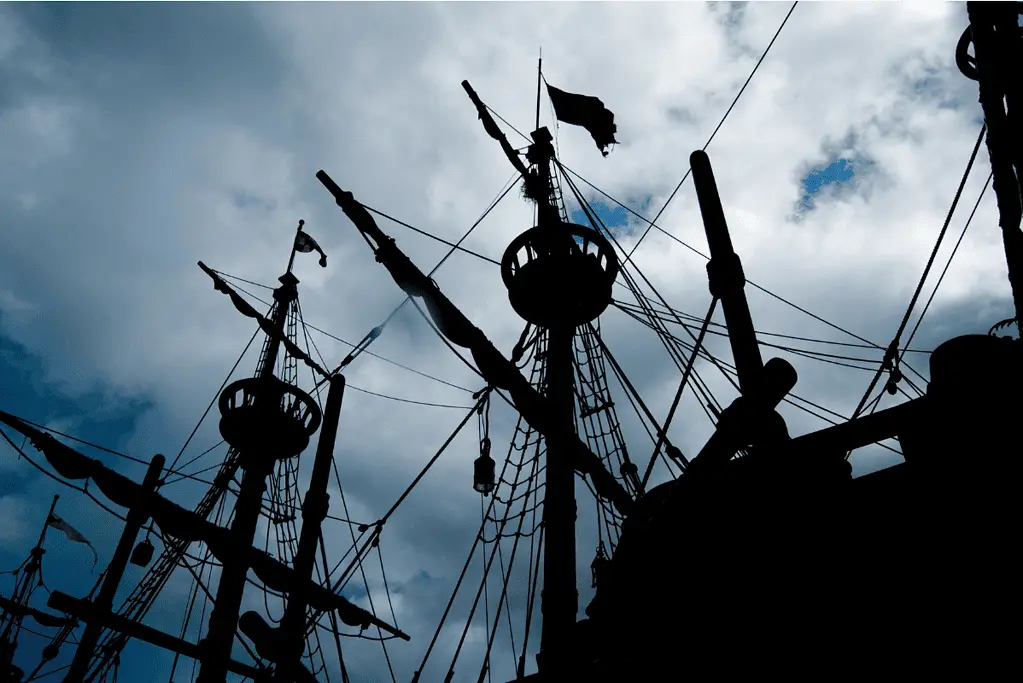 Image of a tall ships's rigging on an overcast day.