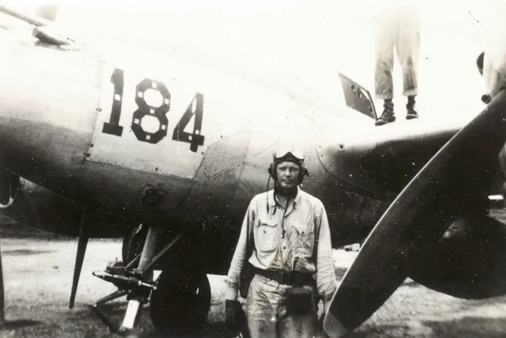 pioneers-of-aviation-charles-lindbergh Image of the iconic Charles Lindbergh stands in front of a North American P-38 Lightning.