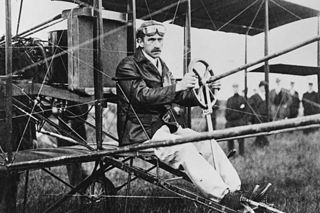 pioneers-of-aviation-glenn-curtiss Image of aviation icon Glenn Curtis prepares for a flight in a "June Bug."