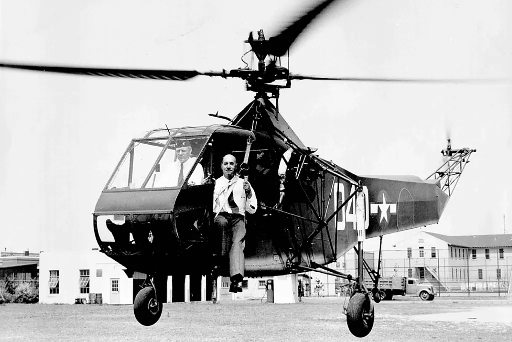 pioneers-of-aviation-igor-sikorsky Image of helicopter pioneer Igor Sikorsky takes flight in an early rotary-wing aircraft in 1944.