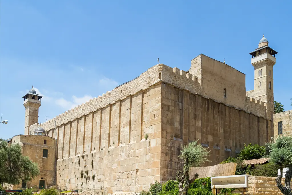 Image of the majestic exterior of the Cave of the Patriarchs, a sacred site.