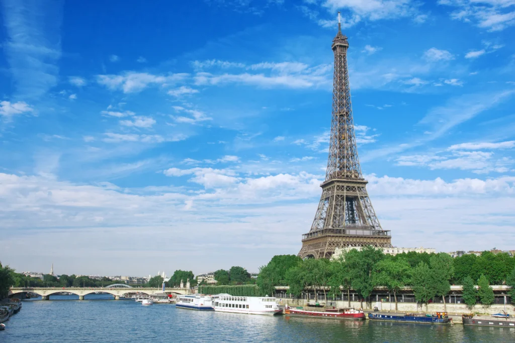 Image of the Eiffel Tower from across the Seine River for a blog post about the tallest buildings in history