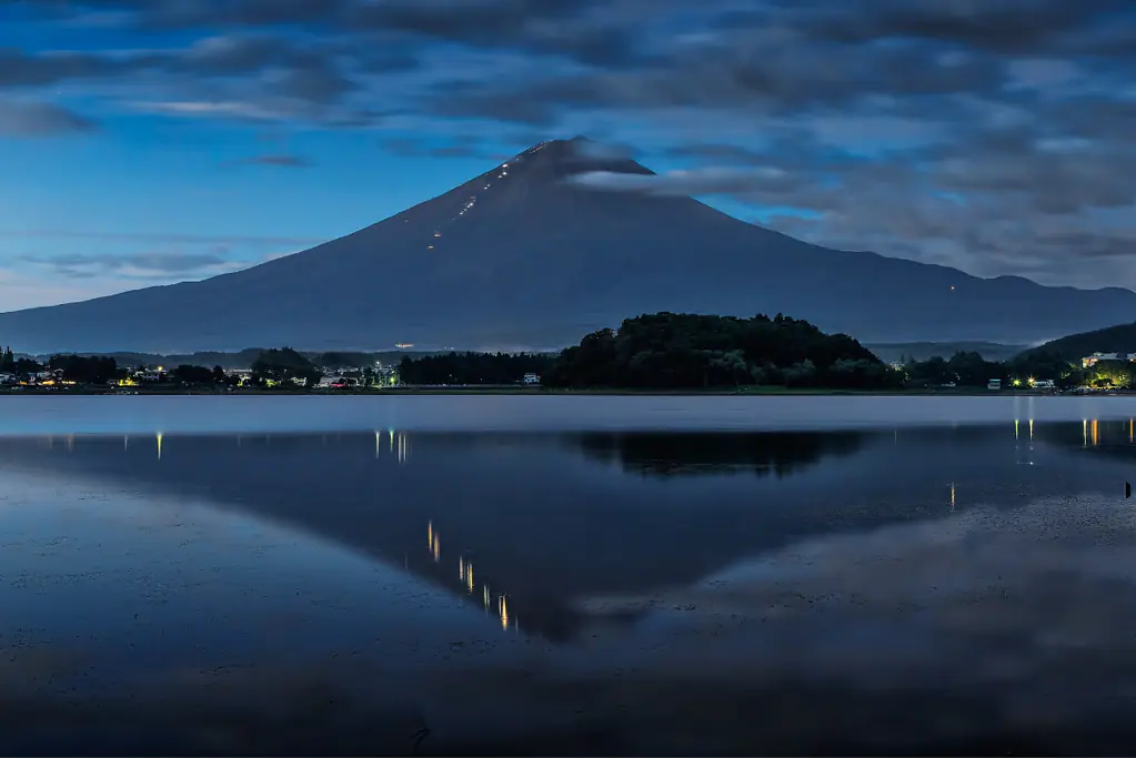 facts-about-junko-tabei-asthma-survivor Image of Mount Fuji's nocturnal silhouette: Junko Tabei's first peak, defying asthma to reach new heights for a blog post covering interesting facts about Junko Tabei.